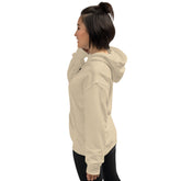 Light cream unisex hoodie side view with hood and drawstrings