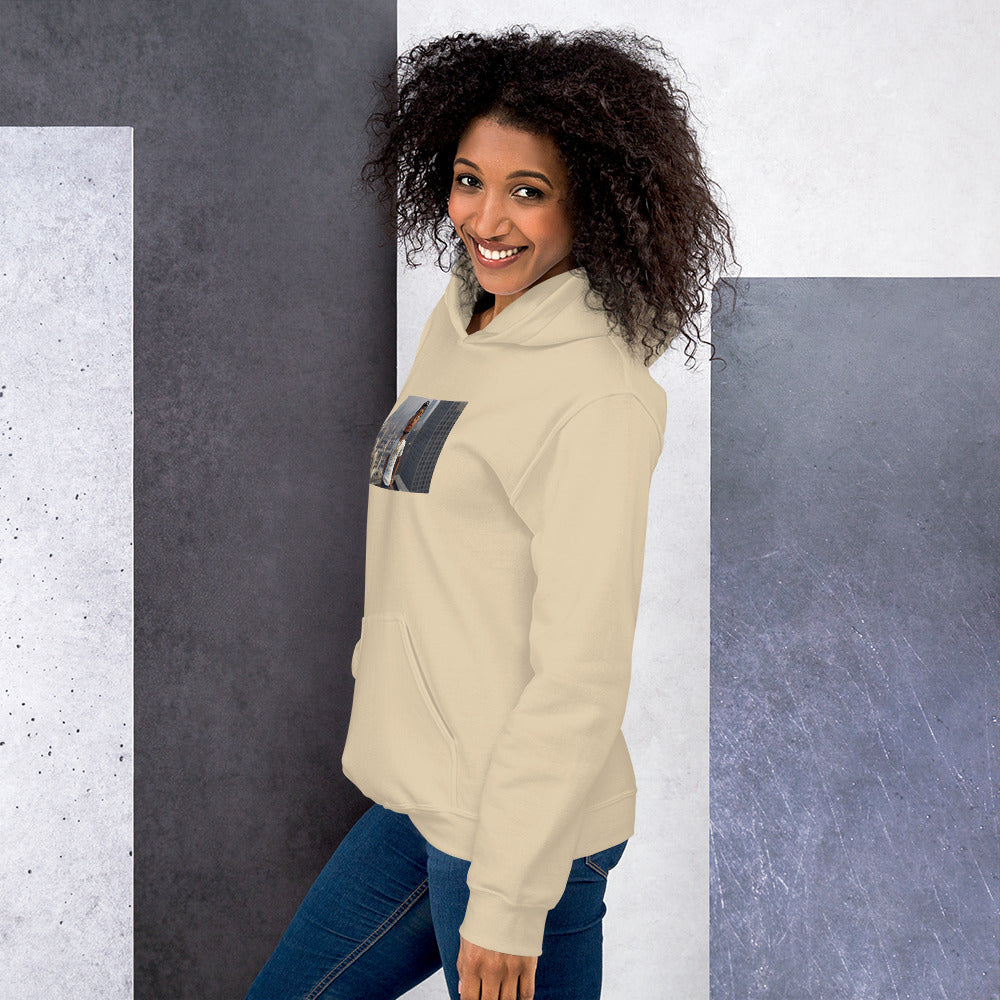 Light beige pullover hoodie with hood and front photo graphic, side view