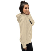 Sand unisex hoodie with hood and chest graphic panel in profile view.