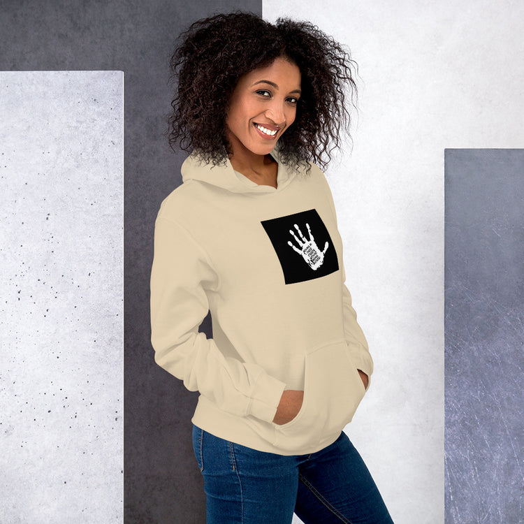 Cream unisex hoodie with hood, kangaroo pocket, and black graphic patch