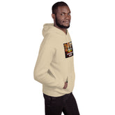 Cream unisex hoodie with front graphic patch, profile view