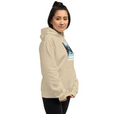 Light sand pullover hoodie with front graphic and hood, three-quarter view