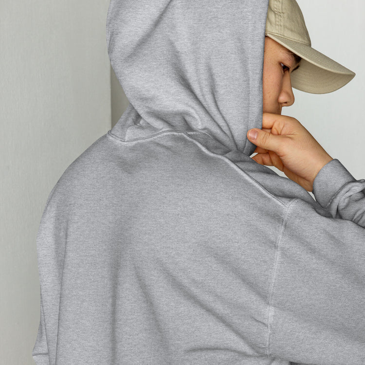 Unisex light heather gray hoodie close-up, hand holding the hood opening