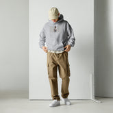Unisex light heather gray hoodie with hood and front kangaroo pocket