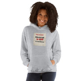 Light gray unisex hoodie with hood and front graphic print, front view.