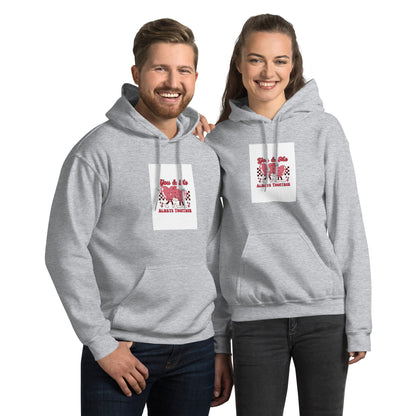 Light gray pullover hoodie with hood and front pocket, square chest graphic print.