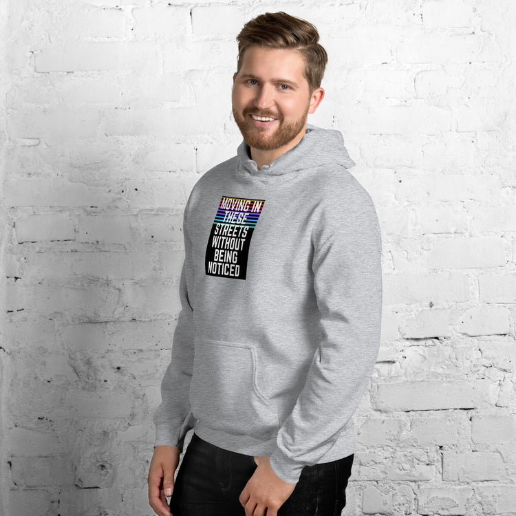 Unisex grey pullover hoodie with front graphic, hood and kangaroo pocket.