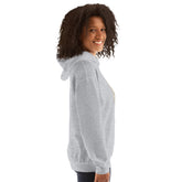 Light gray hoodie side view with hood up and relaxed fit.