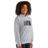 Unisex heather gray hoodie with hood, kangaroo pocket, and chest graphic print.