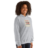 Light gray hoodie with chest graphic print and hood, front 3/4 view.