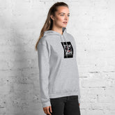 Unisex gray pullover hoodie with black logo patch and drawstring hood